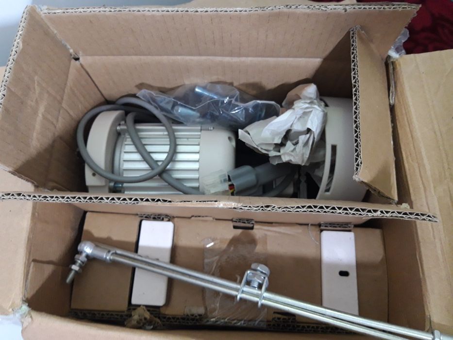 Mașina de cusut și surfilat