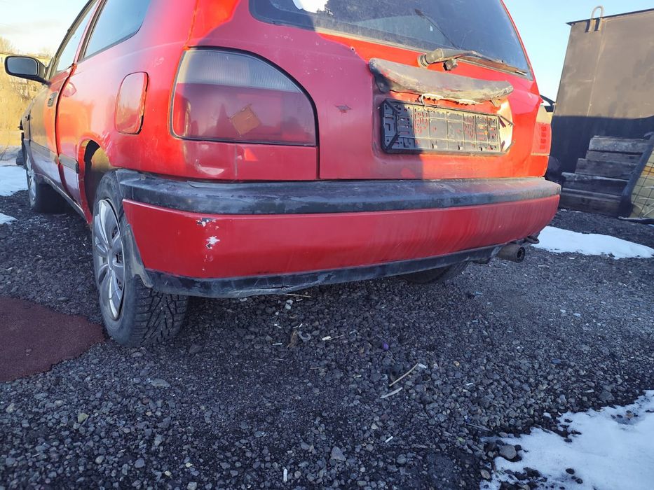 Бампер задний Ниссан Санни