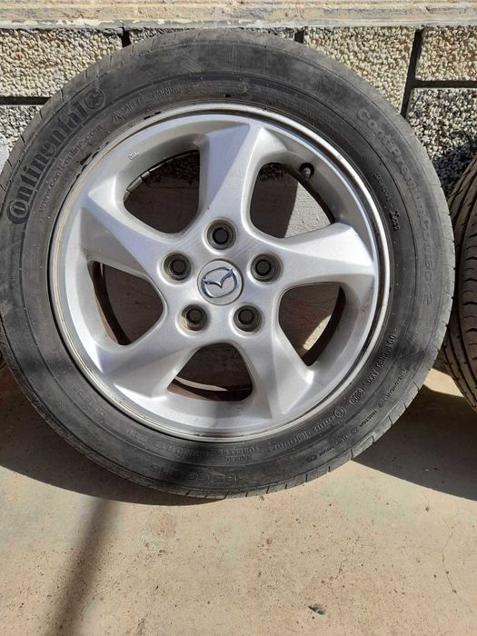 Джанти с гуми за Мазда  15"