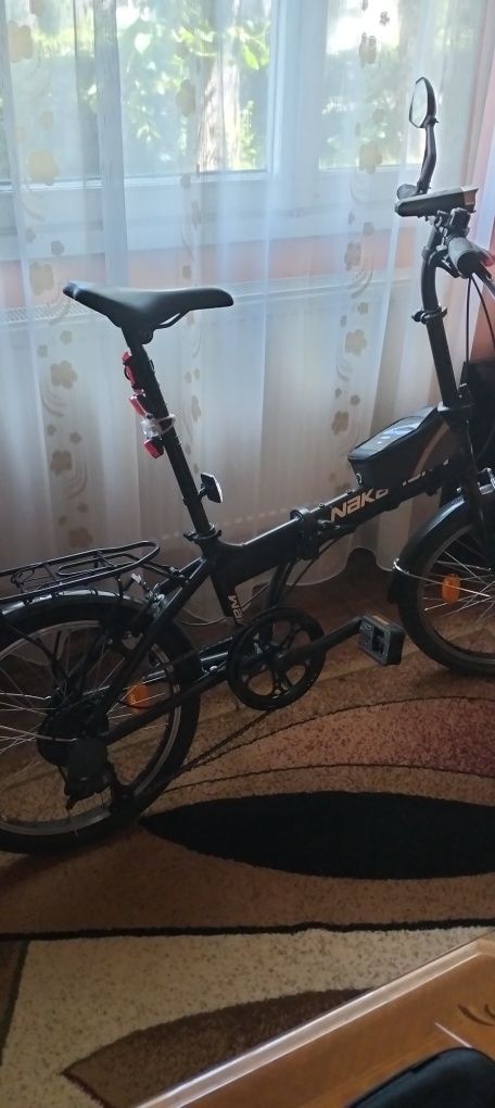 Vand bicicleta puțin rulata