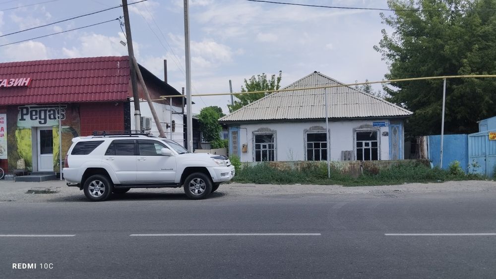 Дом или участок под бизнес район вокзал карабулак возле маг континент