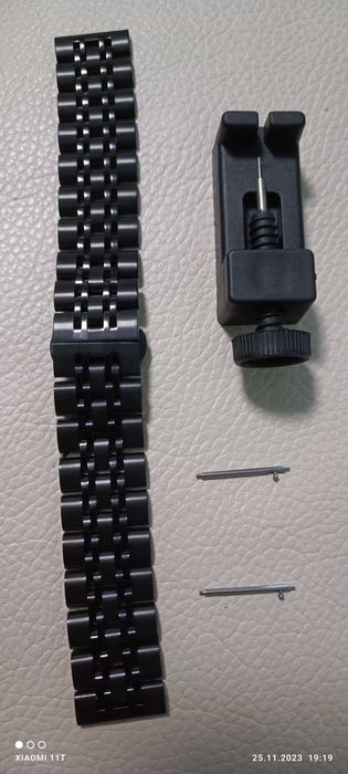 Curea metalică ceas