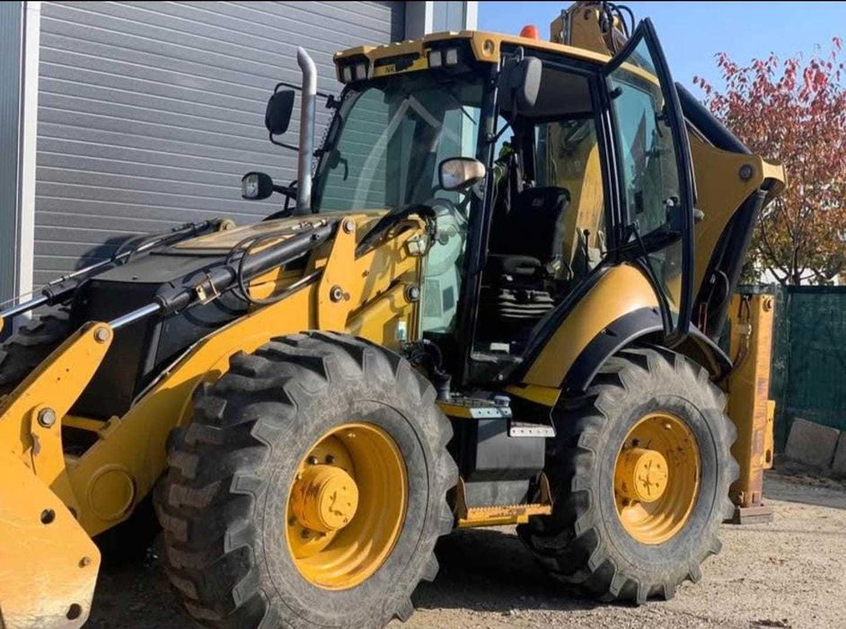 Buldoexcavator  CAT 434 F2 cu roti egale