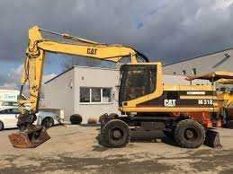 Dezmembrez excavator pe roti Caterpillar M 318