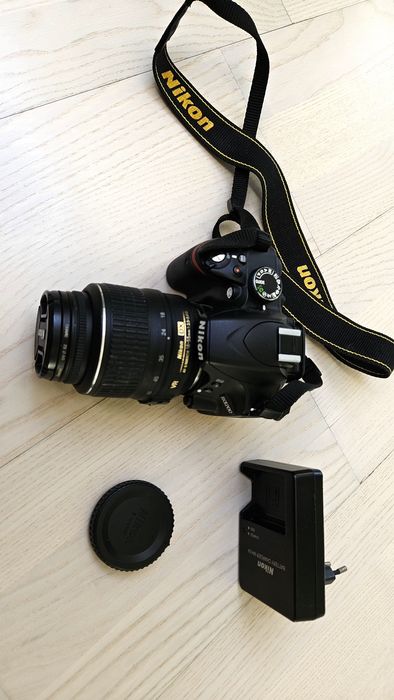 Nikon D3200l SLR camera with an 18-55mm VR lens.