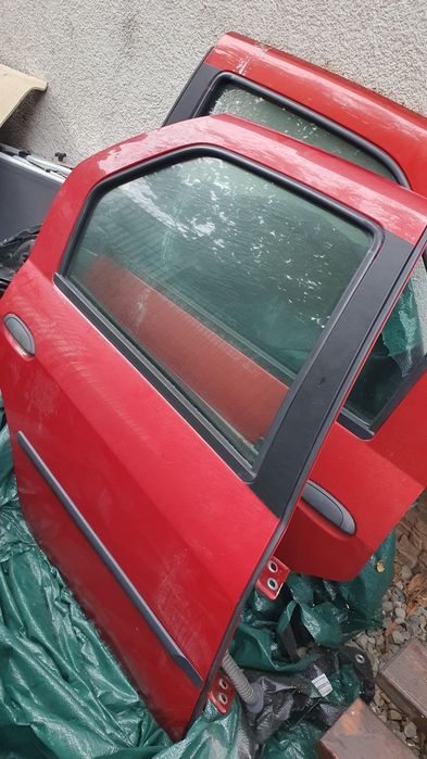 Elemente caroserie spate Logan