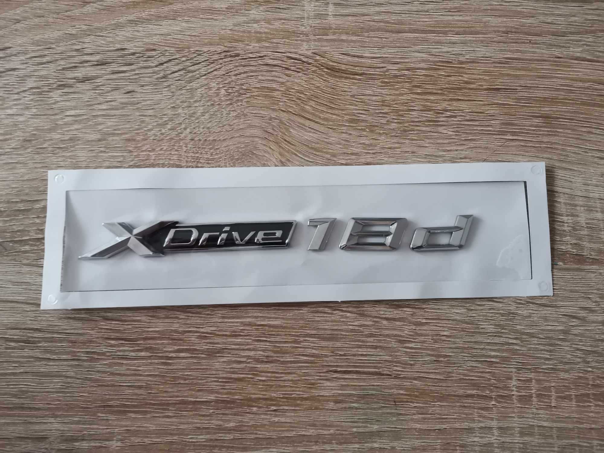 сребрист надпис BMW Xdrive 18d