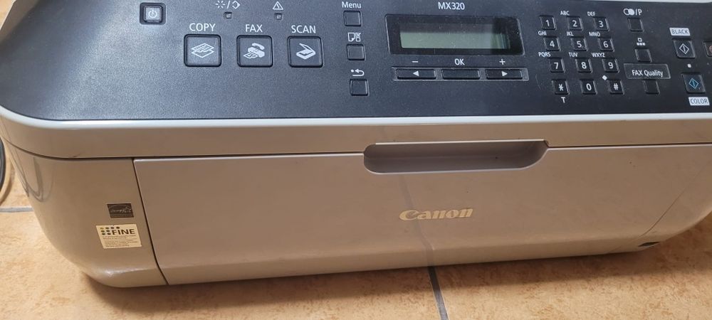Vând imprimanta Canon MX320