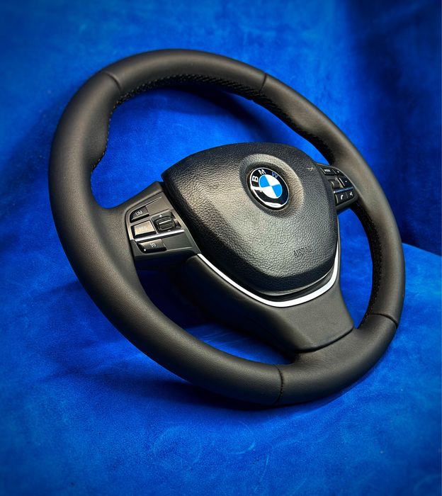 Volane Bmw imbracate/tapitate in piele naturala vand sau schimb