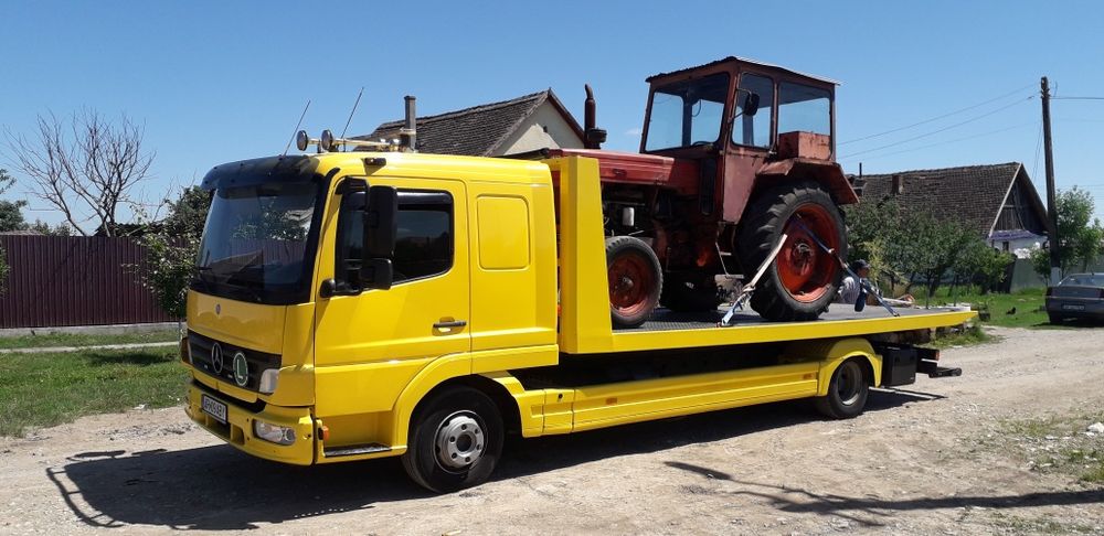 Transport utilaje . Tractări auto