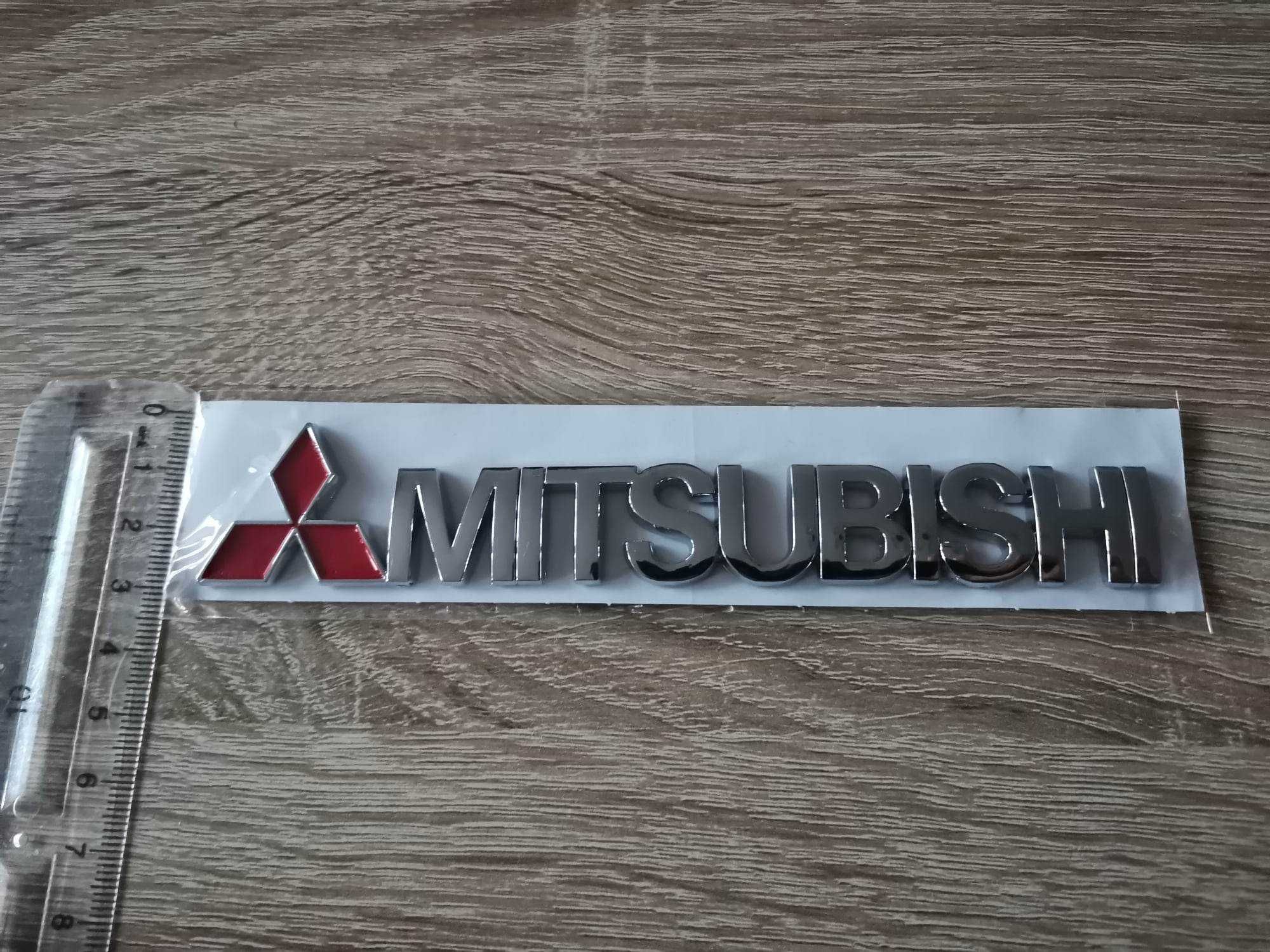 Емблеми надписи Мицубиши Mitsubishi