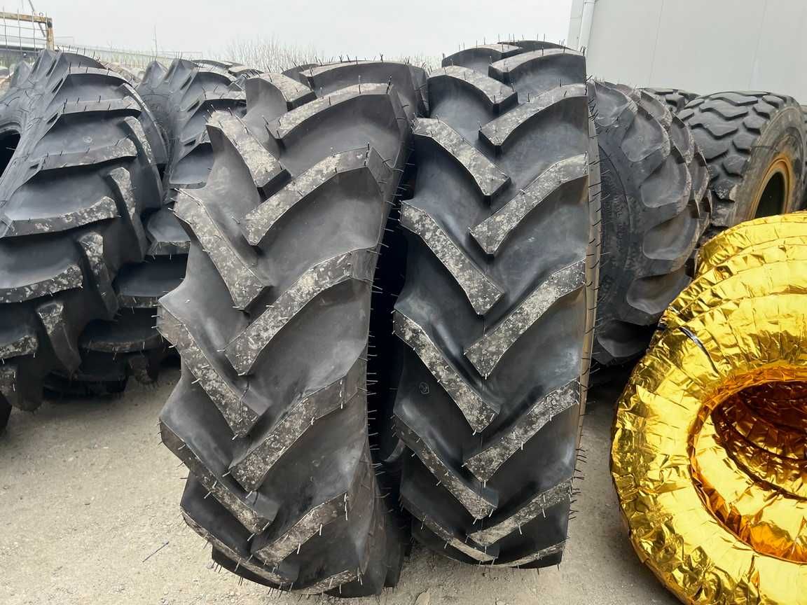 Cauciucuri noi 16.9-30 pentru tractor Massey Ferguson cu 14 pliuri