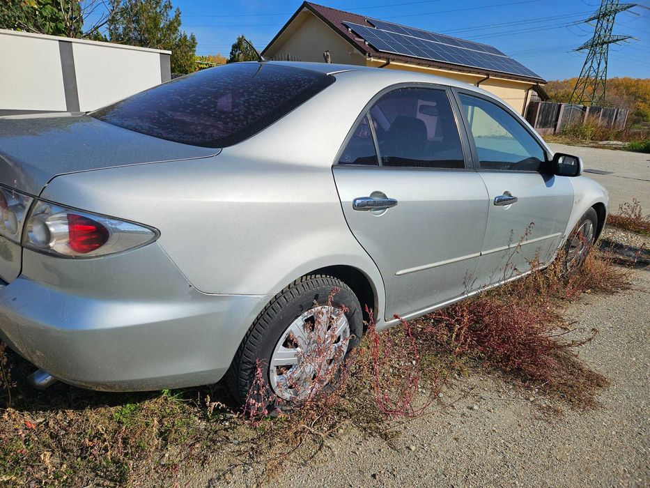 Mazda 6 - 2.0 diesel - an 2003 - 240.000 km