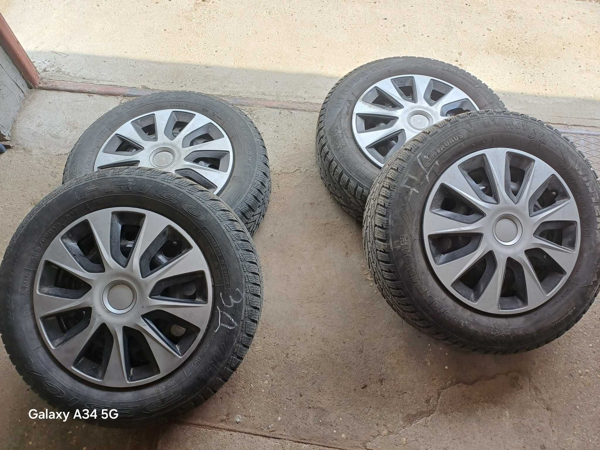 Продавам метални джанти за Вектра Б 15 4×100 с тасове и зимни гуми.