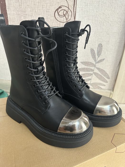 Продам сапоги новые