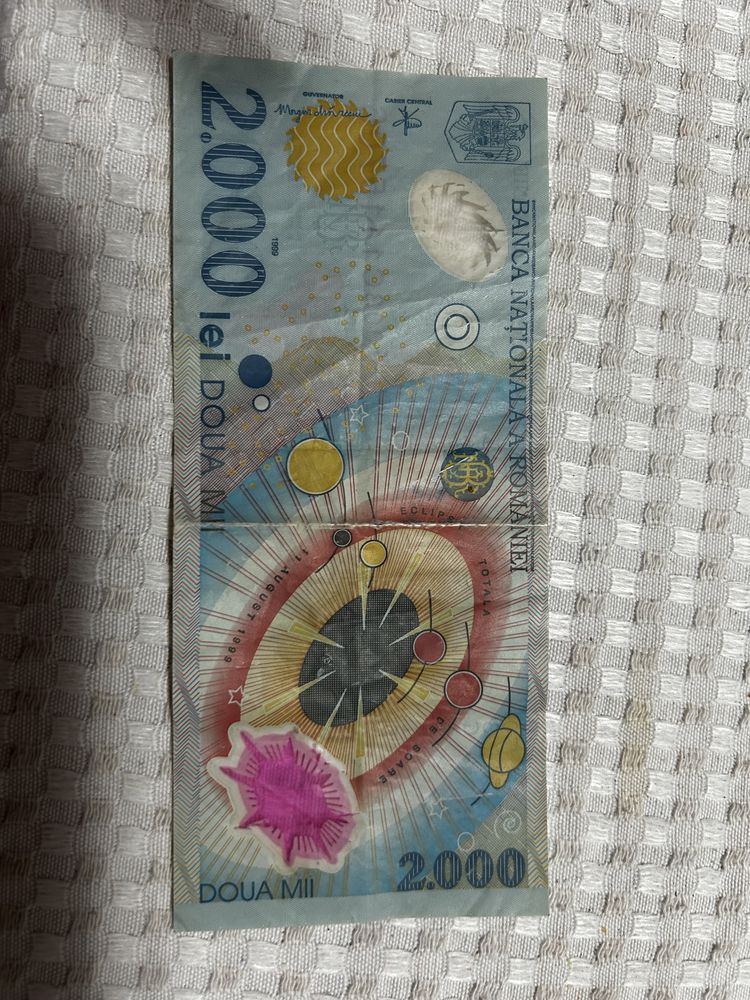 Bancnota 2000 lei cu eclipsa