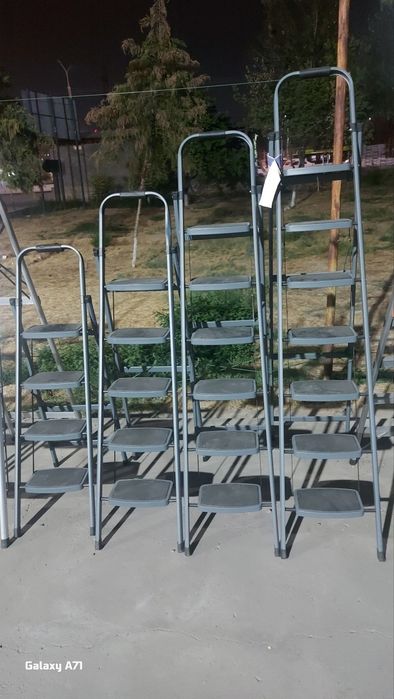 Стремянка телескопический.