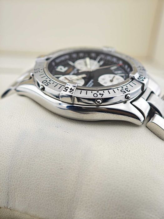 Breitling Colt Chronograph 
и Versace Aion 
A53035