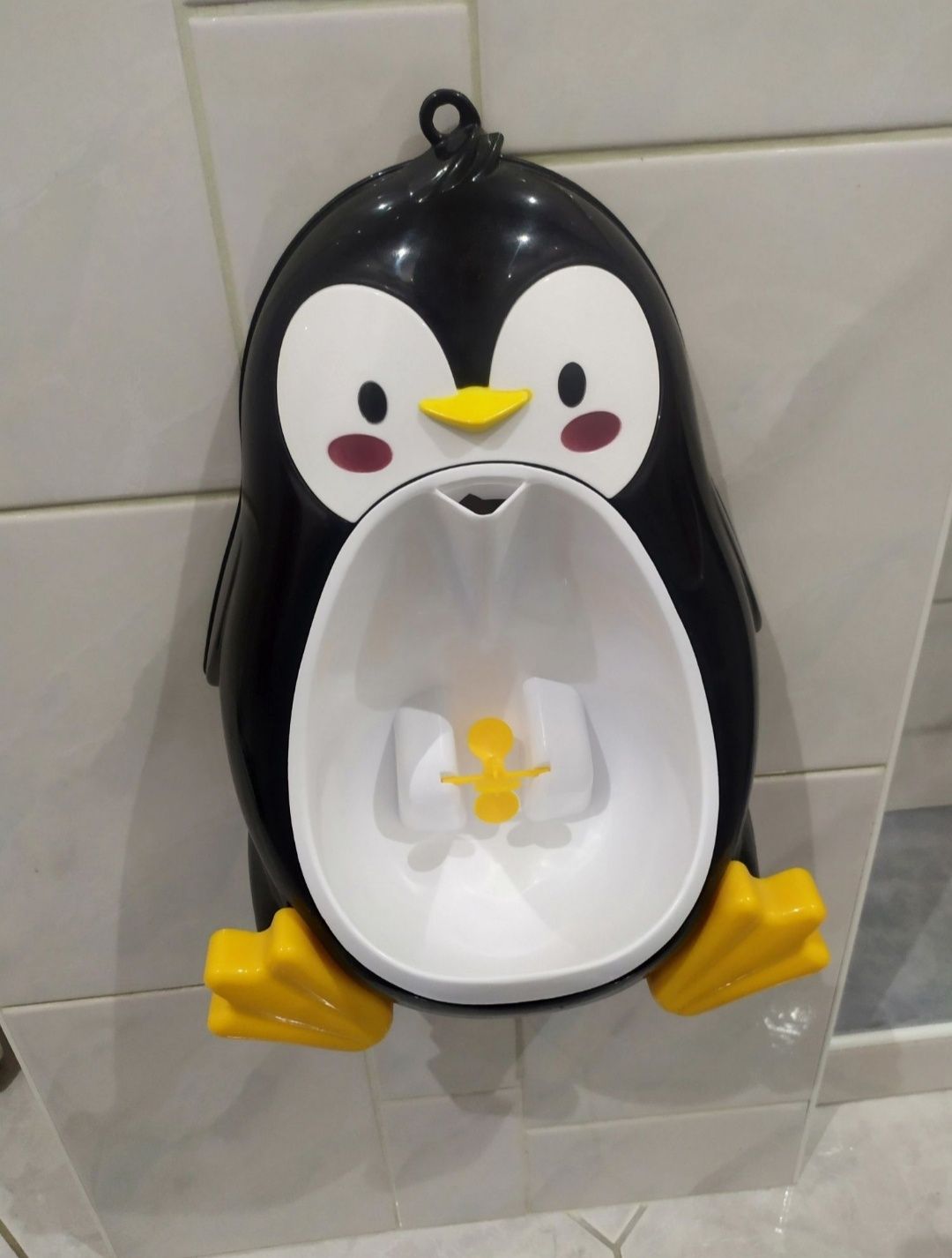 Pișoar in formă de Pinguin