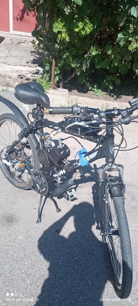 Bicicleta cu motor ,in 2 timpi