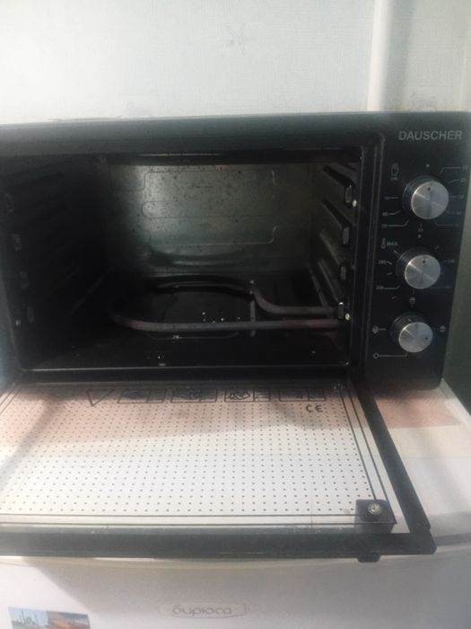 Продам духовку .