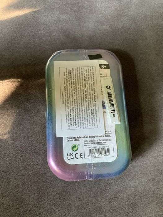 Pokemon Prismatic Evolutions Tin Vaporeon