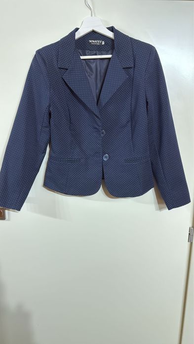 Costum Novatex nou fara eticheta