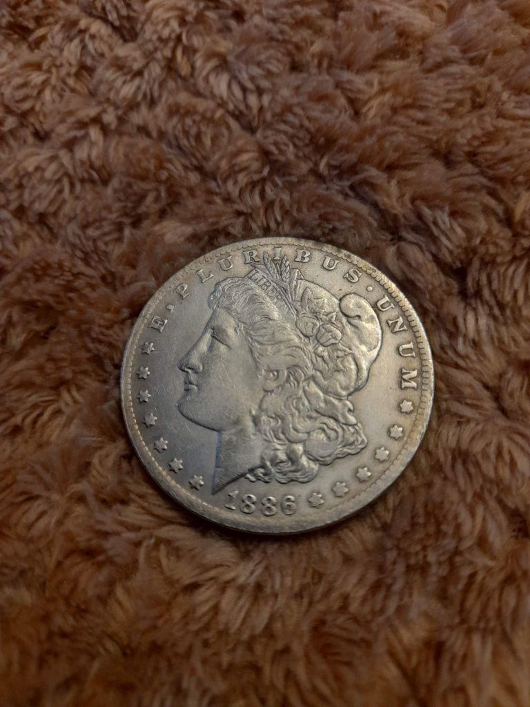 Vând monede argint one dolar original