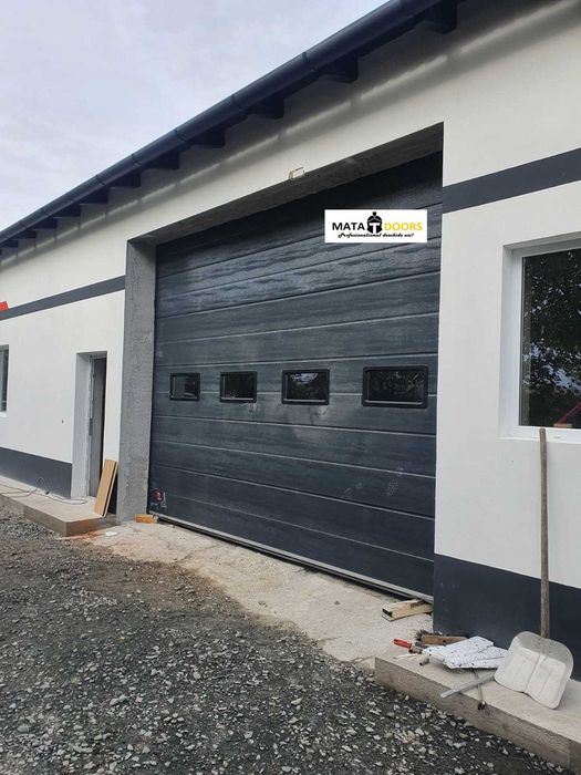 Distribuim la cel mai bun pret usi de garaj-TRANSPORT GRATUIT