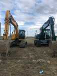 De închiriat excavator pe senile și  pneuri