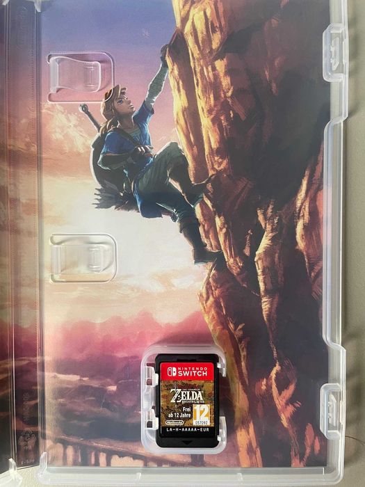 Nintendo Switch OLED (+3 games, +controller)