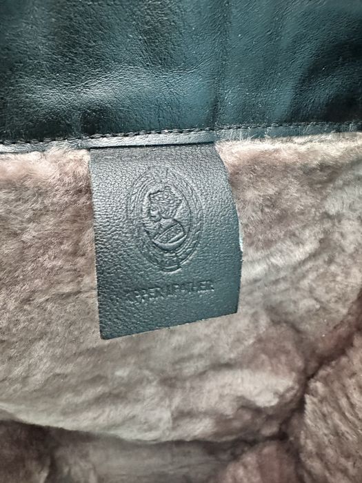 Черные лакированные сапоги