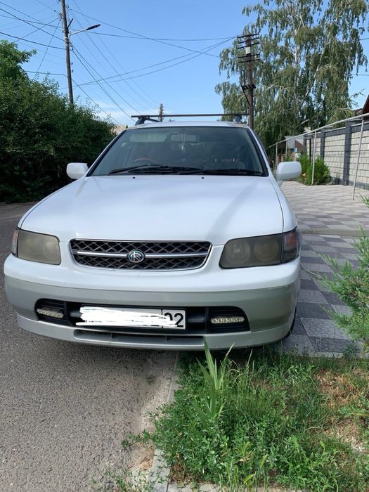 Автомобиль Nisan Rnessa