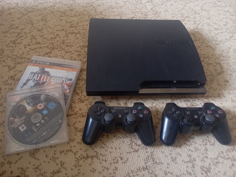PlayStation 3 в подарок один джойстик и игра mortal kombat