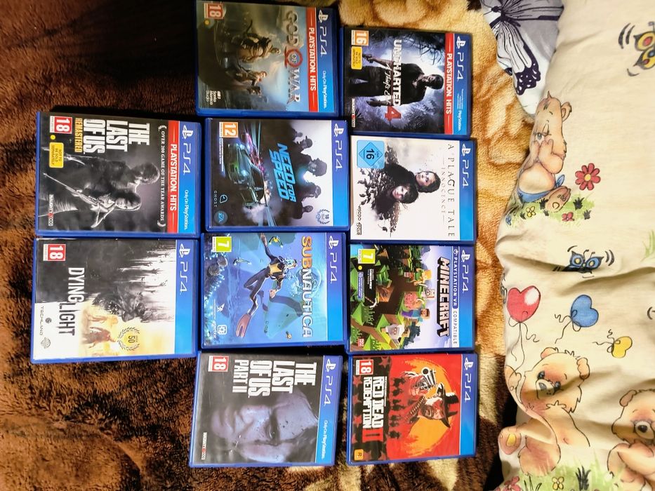 PS4 pro 1TB ca nou plus 10 jocuri