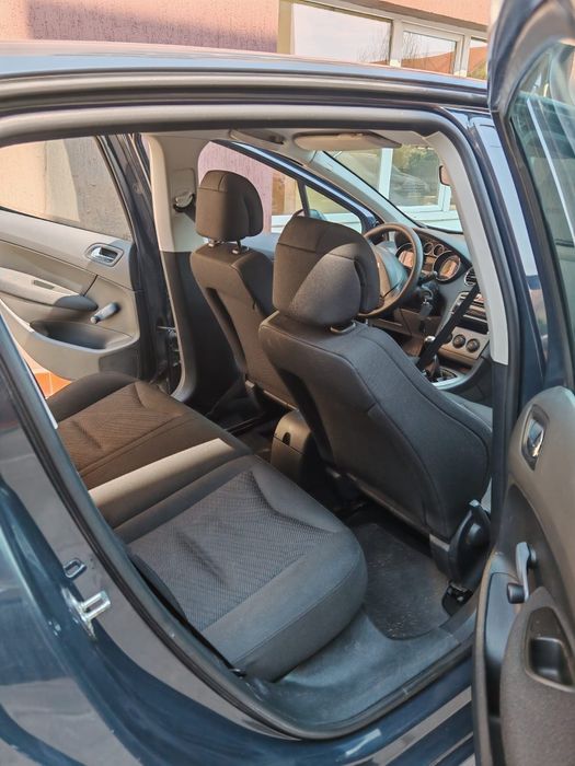 Peugeot 308 ,benzina 1,4 , an 2008