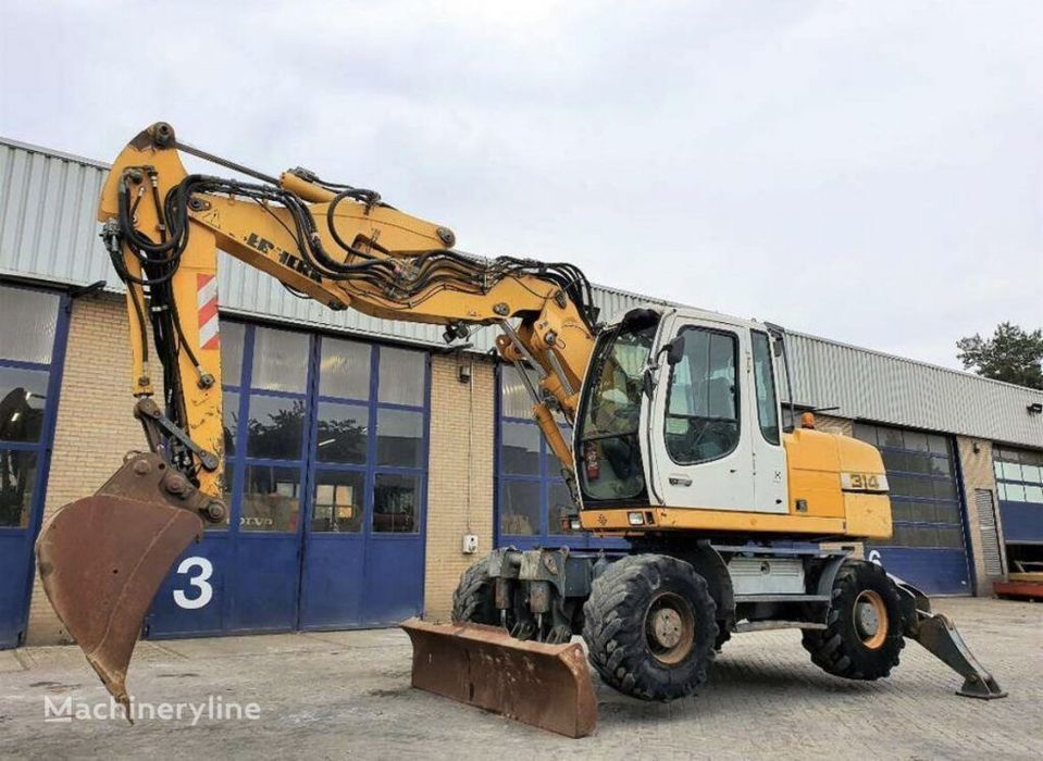 excavator pe pneuri marca liebherr a314
