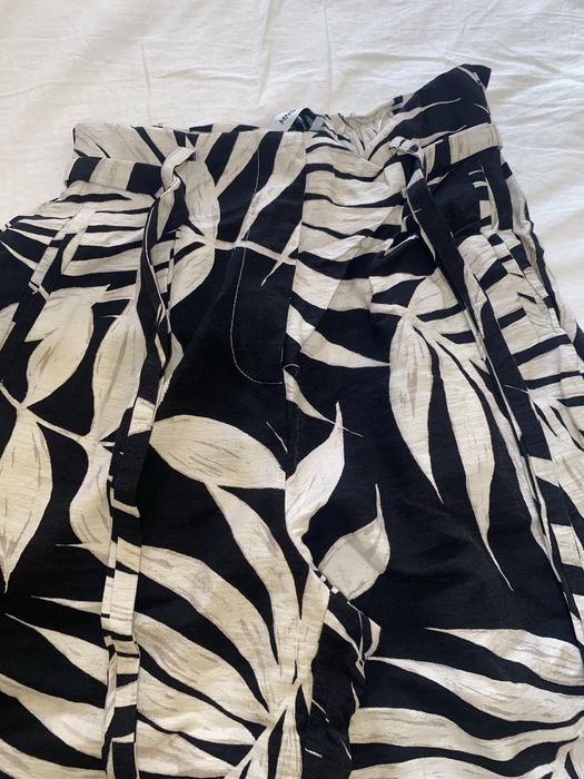 Широк панталон с висока талия Mango