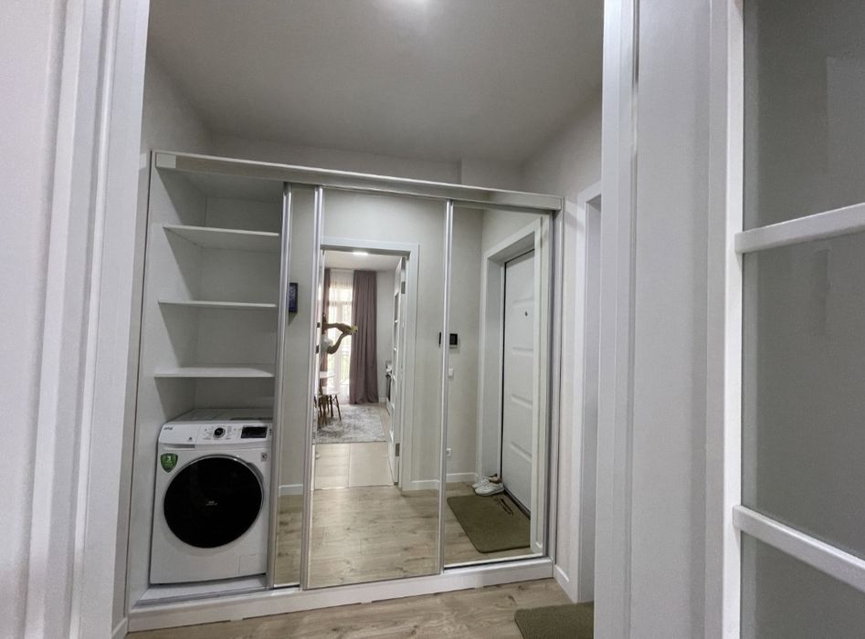 Olmazor city 1 etaj 2 xona + terrasa + garaj upakovka