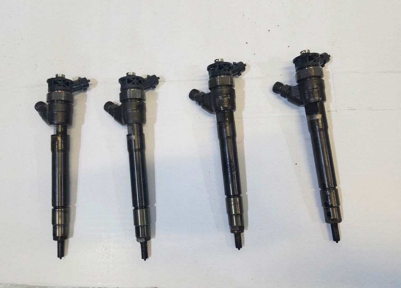 Injector Nissan Qashqai 1.6 DCI cod 0445110414