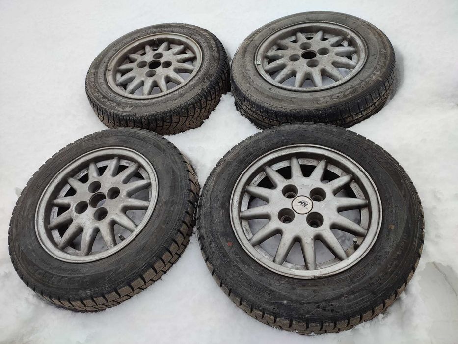 Титановые диски 14 дюймов с шинами 175мм/70мм. Две шины Dunlop, зимние