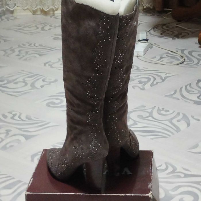 Продам сапоги новые