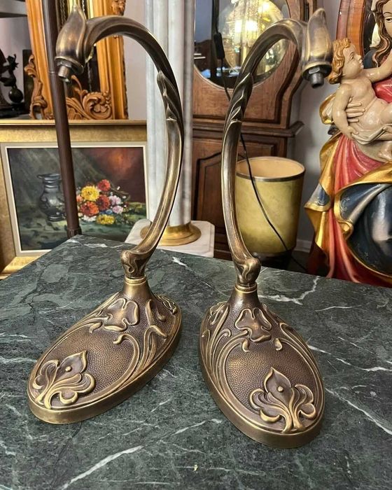 2 suporți din bronz pentru un proiect