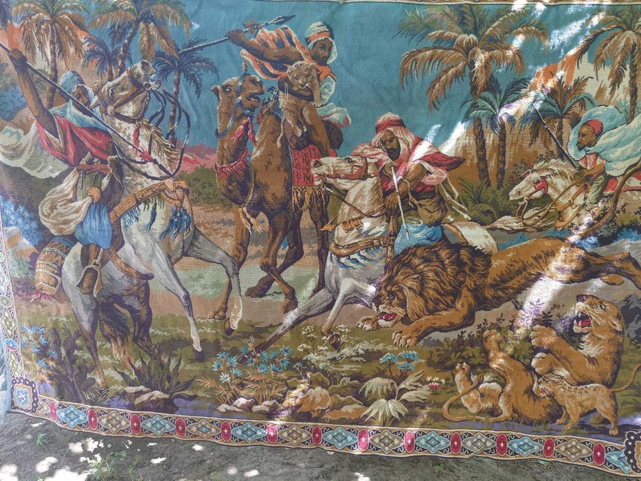 Carpeta Vanatoarea  de lei