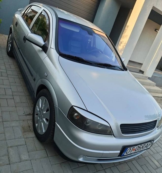 Astra G//2002//1.8 ,125cp
