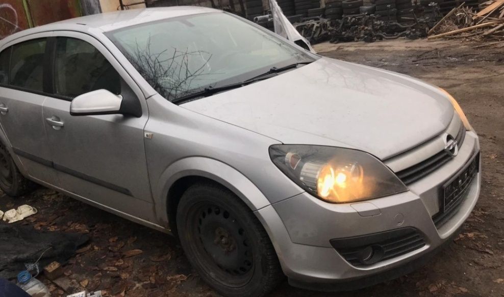 Far/faruri stanga/dreapta Opel Astra H