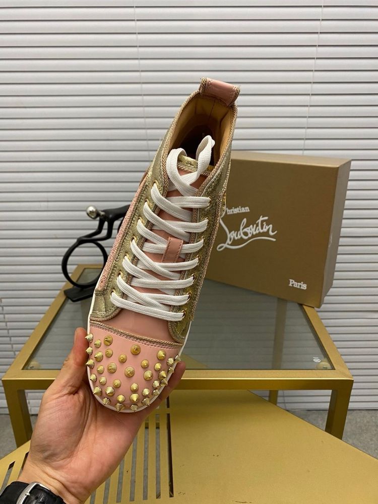 Louboutin “WMNS”