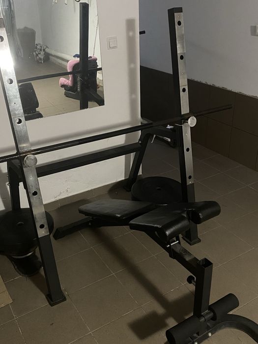 Banca multifunctionala reglabila + greutati 100 kg