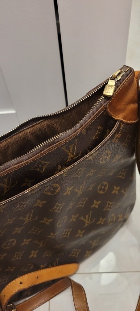 Geanta louis vuitton odeon pret 250 euro