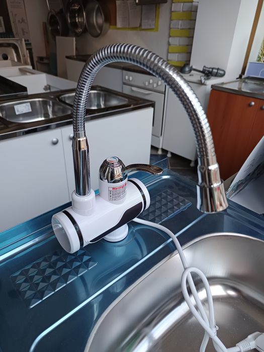 Нов смесител с нагревател за кухня